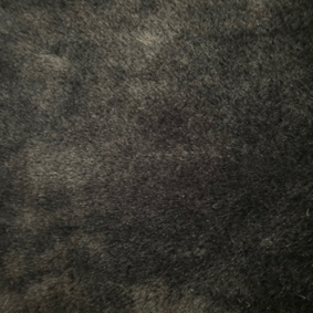 Dark faux fur fabric close-up showing a deeper, textured pile suitable for lifelike plush surfaces