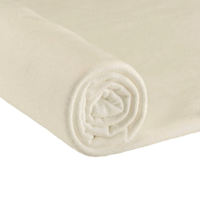 Cream terry fabric roll showing the flatter backing side compared with the looped plush face