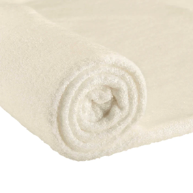 Cream terry fabric rolled into a cylinder to show its soft looped surface