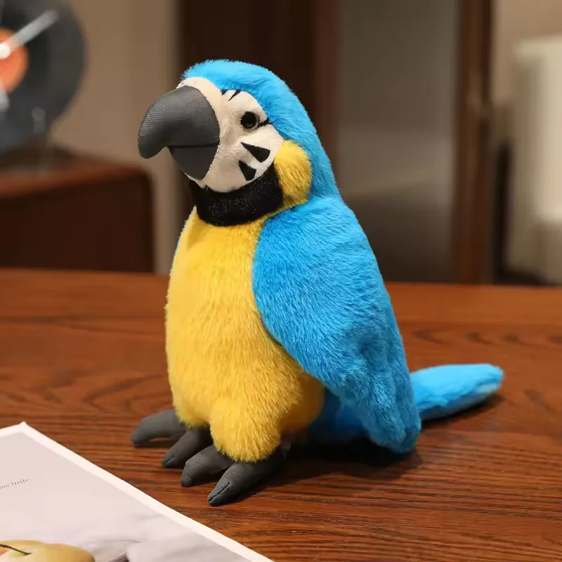 Blue and gold plush parrot toy with a large gray beak and seated body displayed on a wooden table