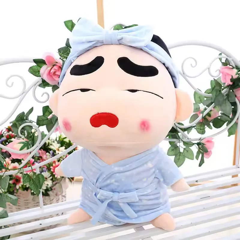 Crayon Shin-chan pajama plush doll with droopy sleepy eyes and open red mouth in matching blue nightwear