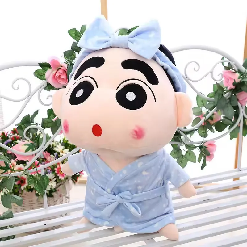 Crayon Shin-chan pajama plush doll with wide surprised eyes, red round mouth, and pale blue robe