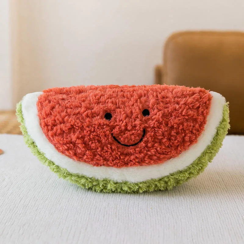 Watermelon slice plush pillow with smiling face and green rind contrast