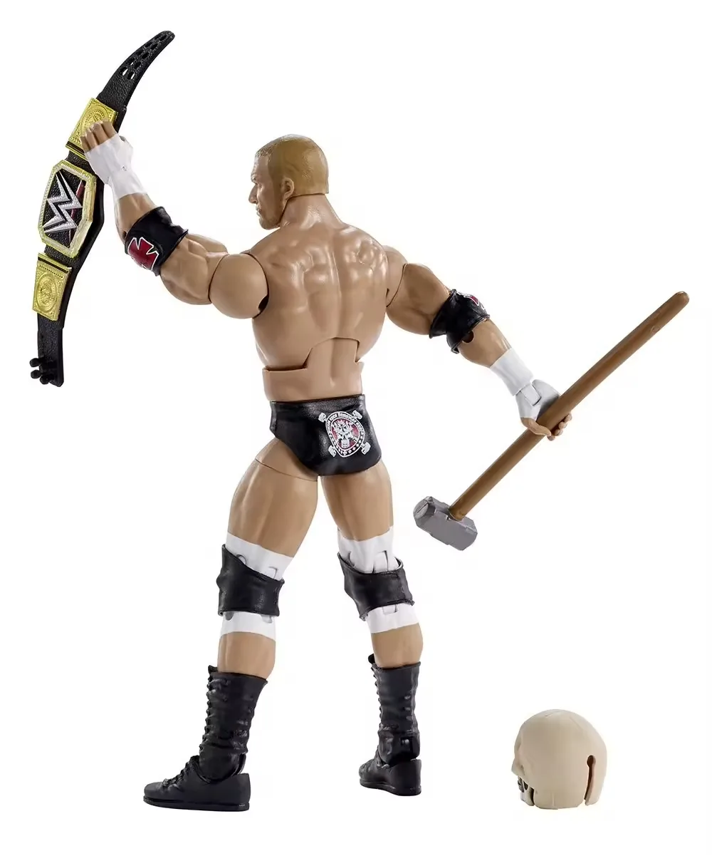 Back view of a 7 inch articulated wrestling figure holding a championship-style belt and hammer with a skull accessory beside the boots
