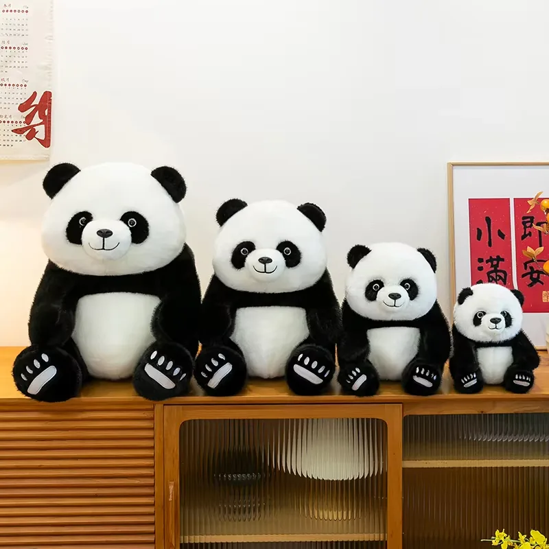 Four seated panda plush toys arranged from large to small as a coordinated size-family collection
