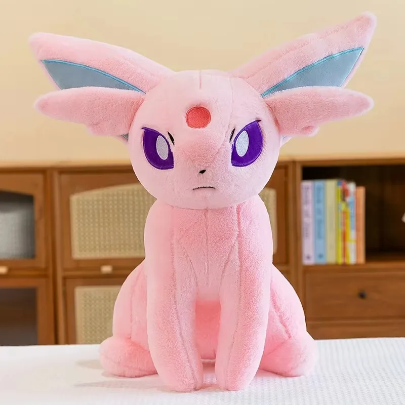 Large Espeon plush doll shown front-facing with pink body, large ears, and purple eyes
