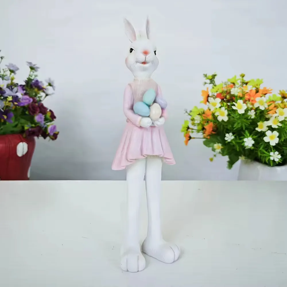 Hand-painted resin fashion rabbit figurine in a pink dress holding pastel Easter eggs for home decor and gift displays