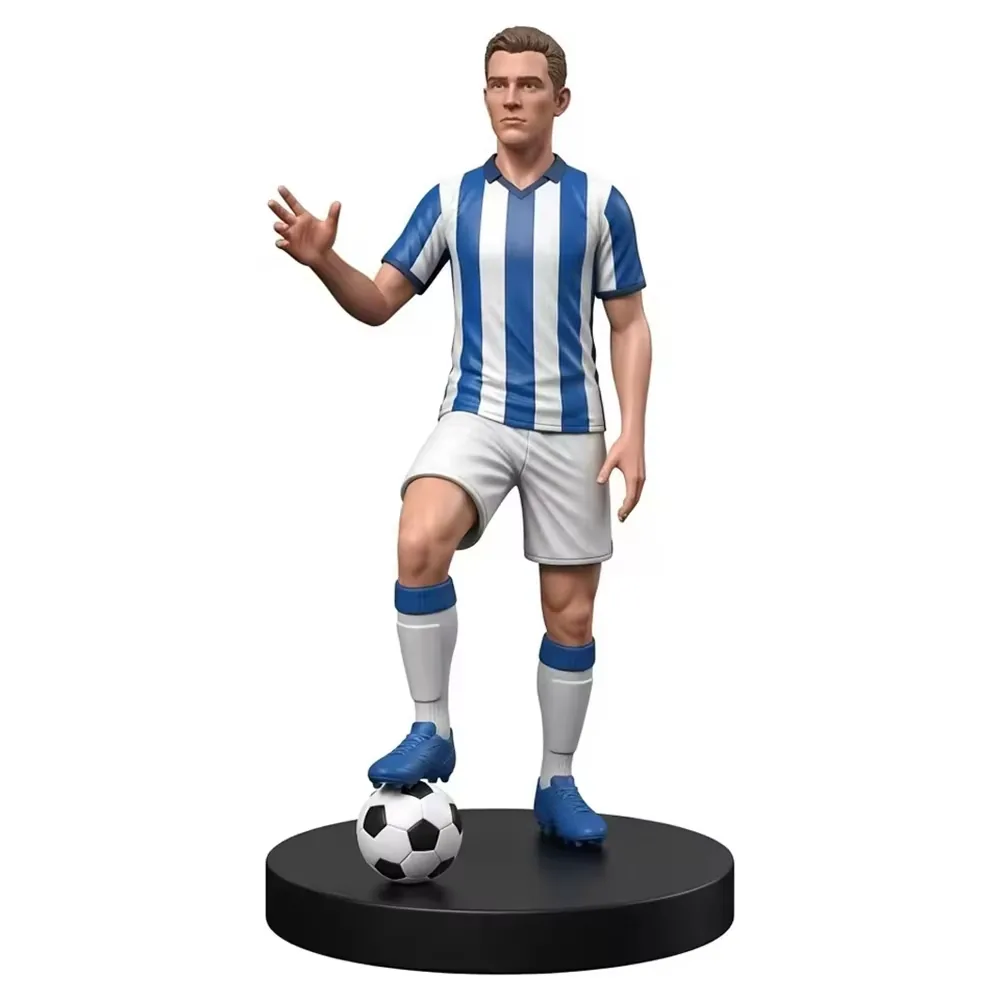 Hand-painted resin football star sculpture in a blue-and-white striped kit with a waving pose and black display base