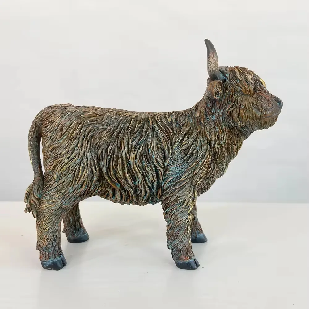 Standing resin Highland cow figurine in full profile with long textured coat and short curled tail