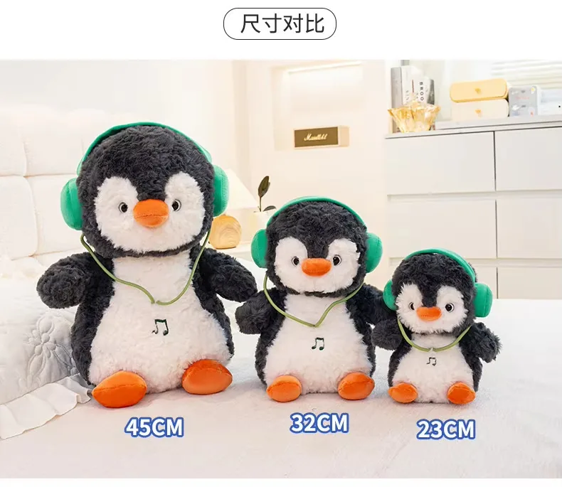 Headphones penguin plush dolls shown together in 23cm, 32cm, and 45cm sizes with green earmuff styling