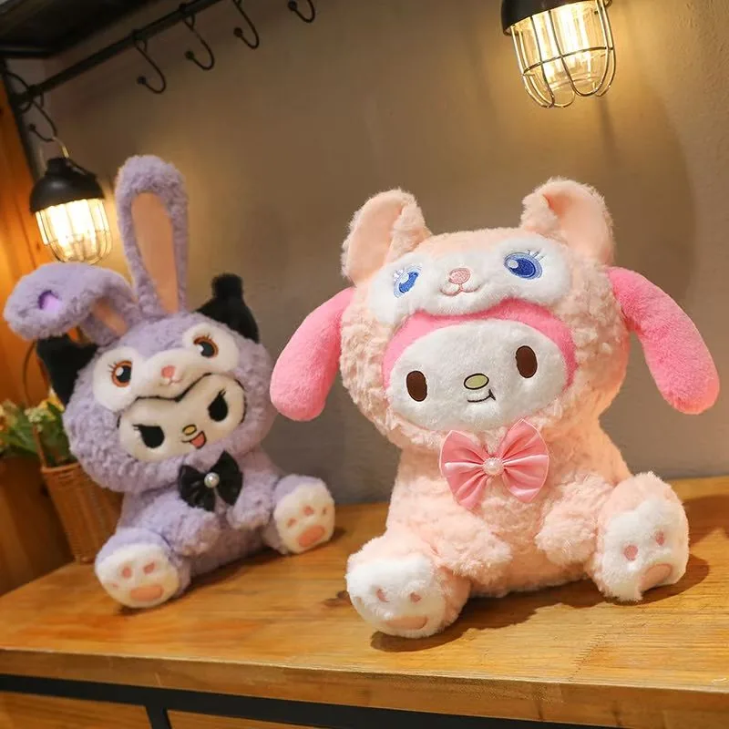 Purple Kuromi plush and pink My Melody plush displayed together as a pair