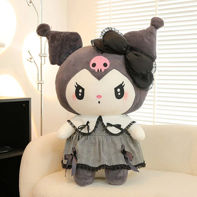 Kuromi gothic princess plush doll seated in a lifestyle room setting with a black lace bow