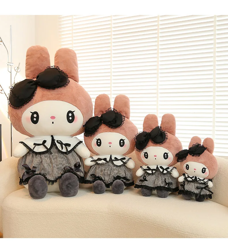 My Melody gothic princess plush doll shown in four different sizes on a sofa