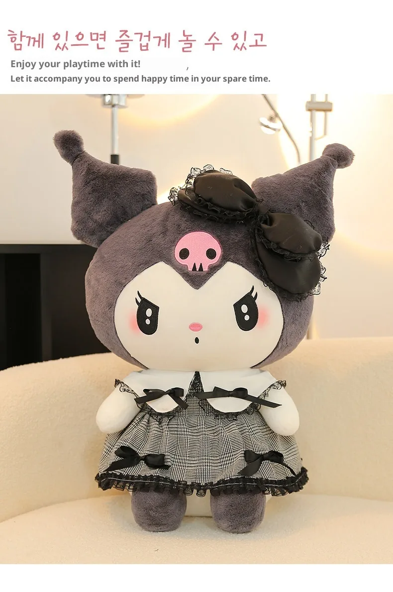Oversized Kuromi gothic princess plush doll displayed alone on a sofa
