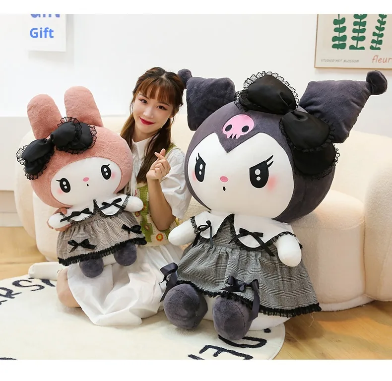 Oversized My Melody and Kuromi gothic plush dolls displayed with a model for scale