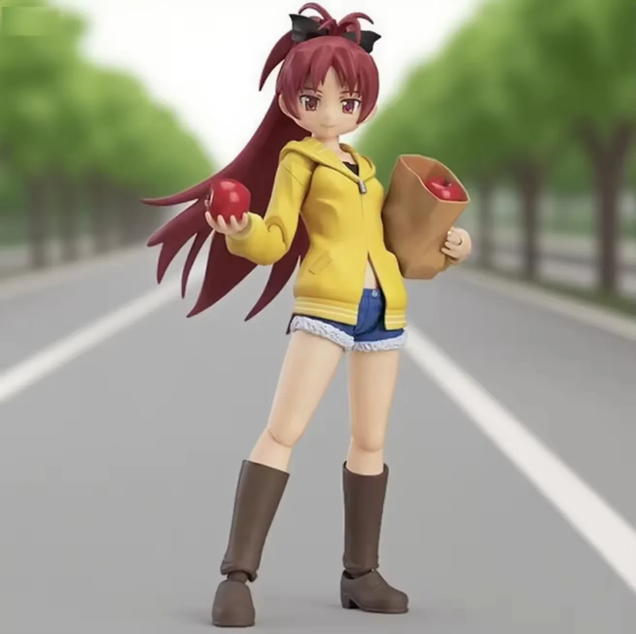 Anime girl PVC figure with burgundy ponytail, yellow hoodie, red apple, and paper shopping bag