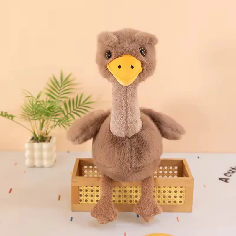 Large ostrich plush doll standing upright with long neck, soft brown fur, and yellow beak
