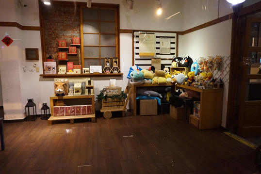 Store shelf and tabletop assortment of plush toys displayed in a retail environment