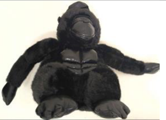 Black gorilla plush with a hard plastic eye area used as an example of detachable eye risk