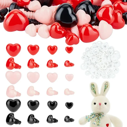 Heart-shaped plastic nose components with matching white backing washers for plush assembly
