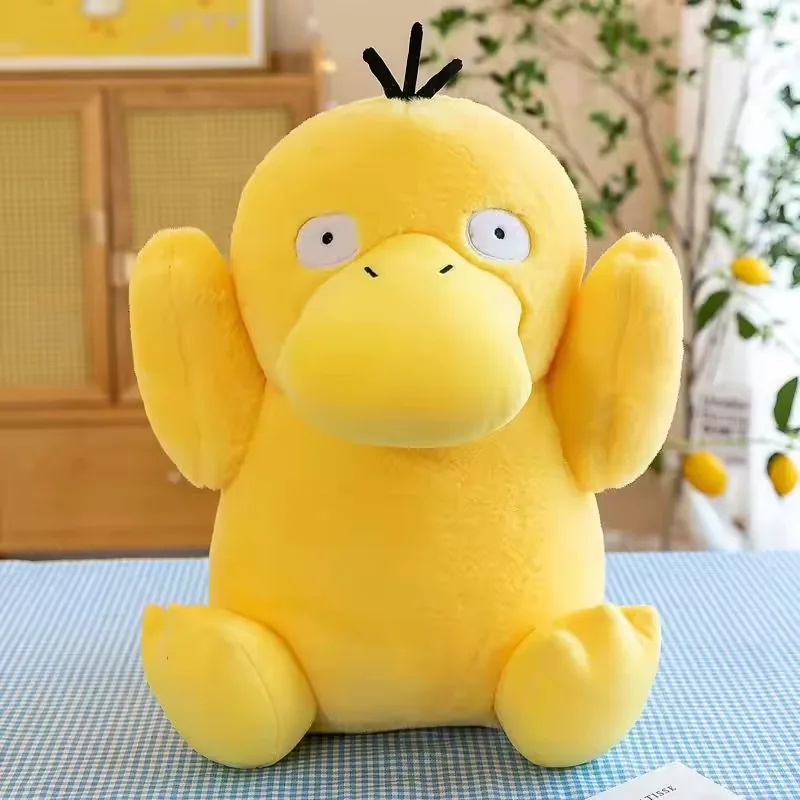 Single Psyduck plush doll front view with raised arms and broad duckbill