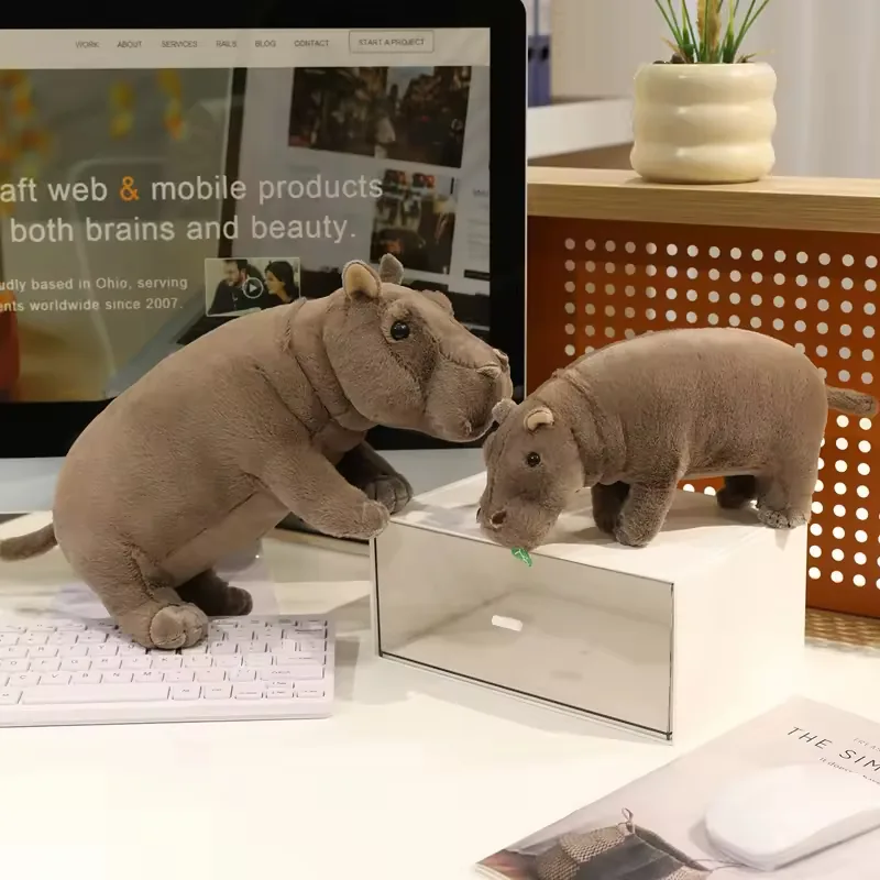 Back view of a realistic hippo plush stuffed animal with smooth grey finish and rounded body proportions
