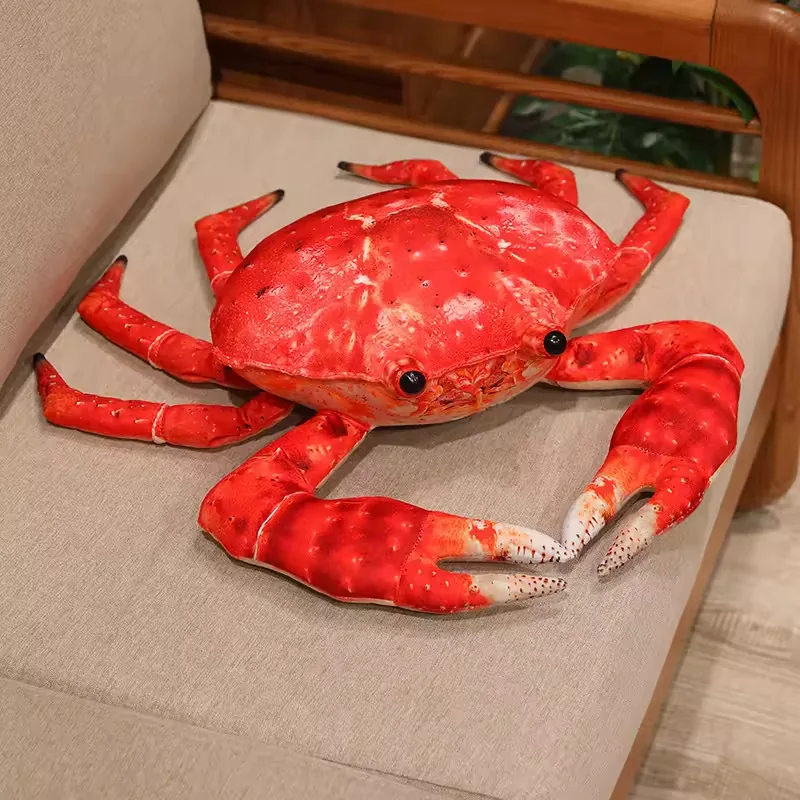 Realistic red plush crab toy displayed on a sofa for room decor and gift styling