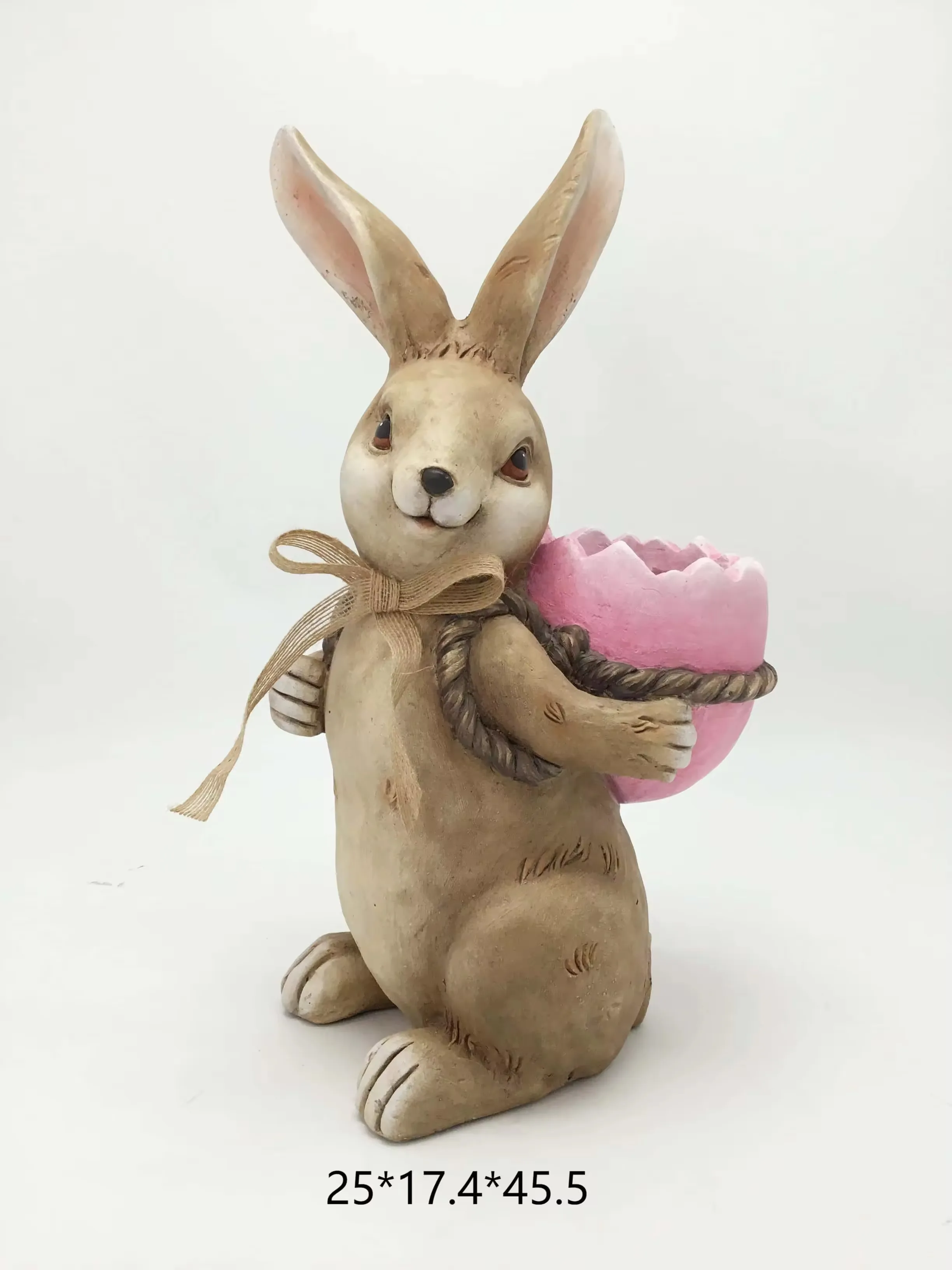 Realistic resin rabbit figurine carrying a pink cracked eggshell basket for spring gift and shelf displays