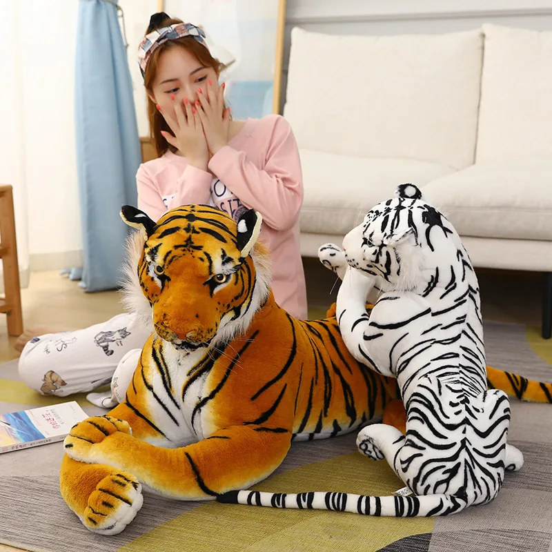 Tiger plush doll with soft filled body, long tail, and readable side profile
