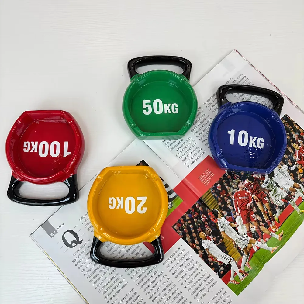 Alternate display view of a hand-painted sports barbell resin ashtray prepared for desk decor and lounge use