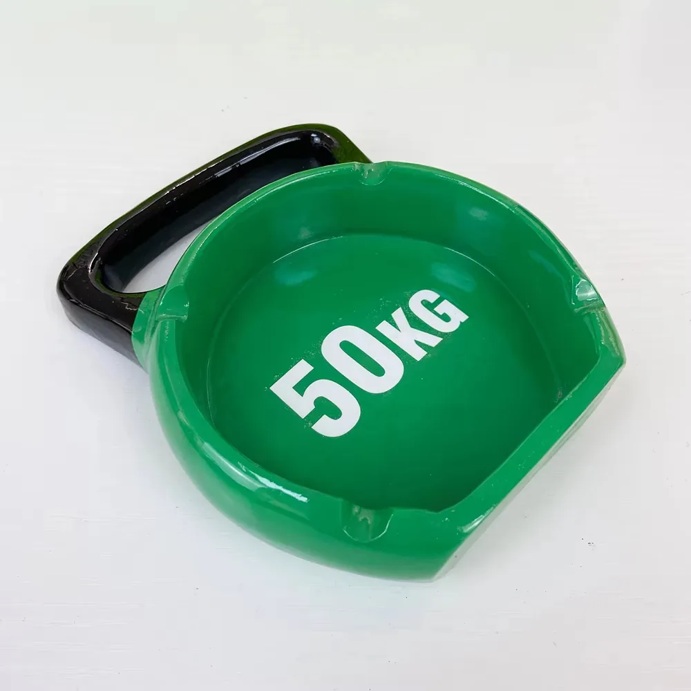 Front display view of a hand-painted resin ashtray with sports barbell design