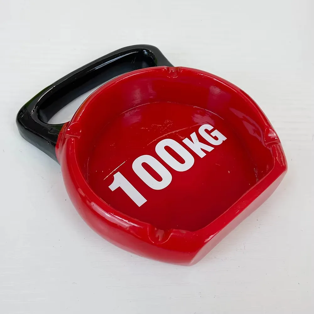 Hand-painted detail view of a sports barbell resin ashtray prepared for desktop decor and lounge use