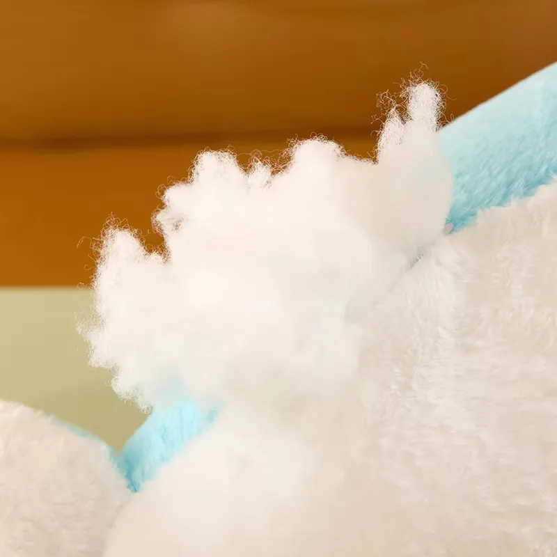Exposed PP cotton filling detail for the dolphin plush pillow cushion