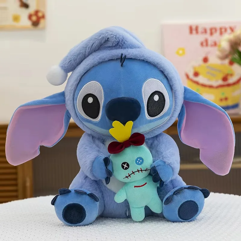 Blue Stitch hooded plush doll holding a mint Scrump accessory with a small red bow tie