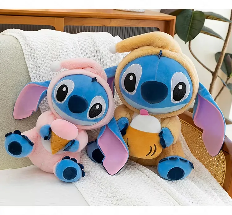 Pink and tan Stitch hooded plush dolls shown together to compare dessert-themed accessories and hood colors