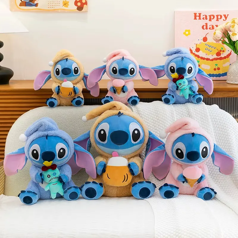 Multiple Stitch hooded plush dolls shown together as a pastel size family in several outfit variants