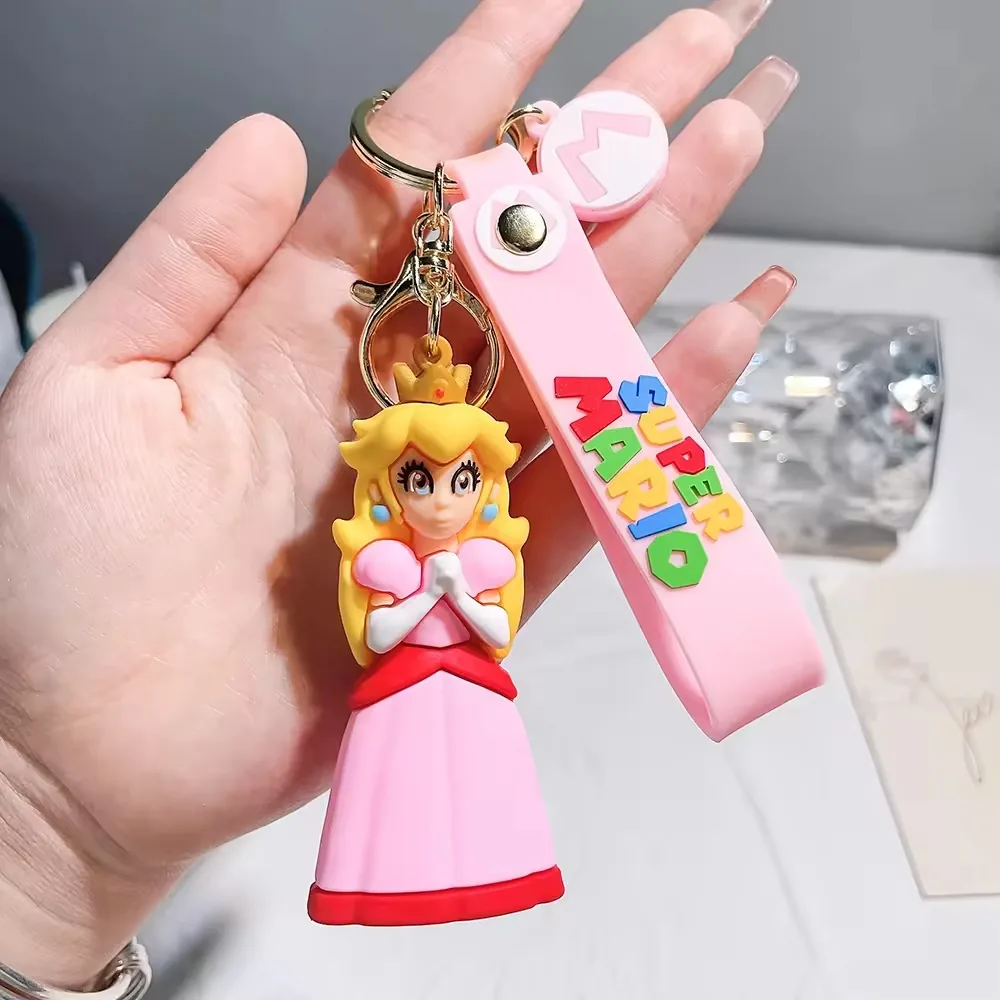 Additional Super Mario Bros PVC keychain character with soft rubber finish and split key ring