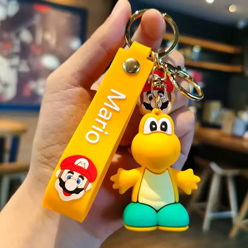 Group shot of Super Mario Bros PVC keychains arranged together for game merch and accessory assortment planning