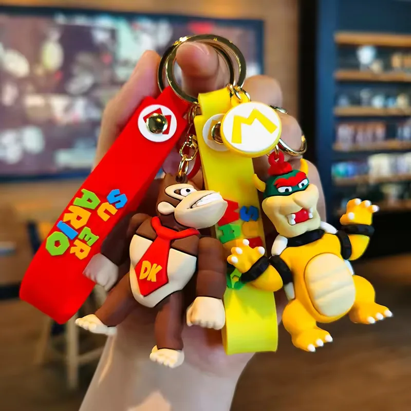 Mixed Super Mario Bros soft PVC keychain lineup shown in bright molded colorways for collection balance review